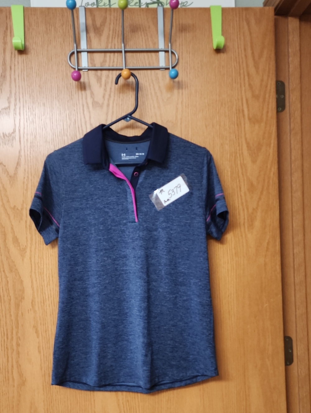 Under Armour Navy Polo Top with Pink Trim womens M number 5379